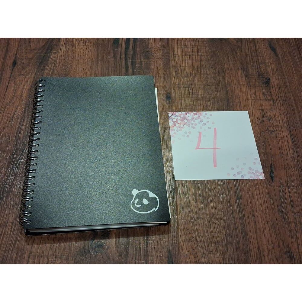 Unused Panda Planner Weekly 2.0 in Black - Plastic Cover Spiral Daily Planner